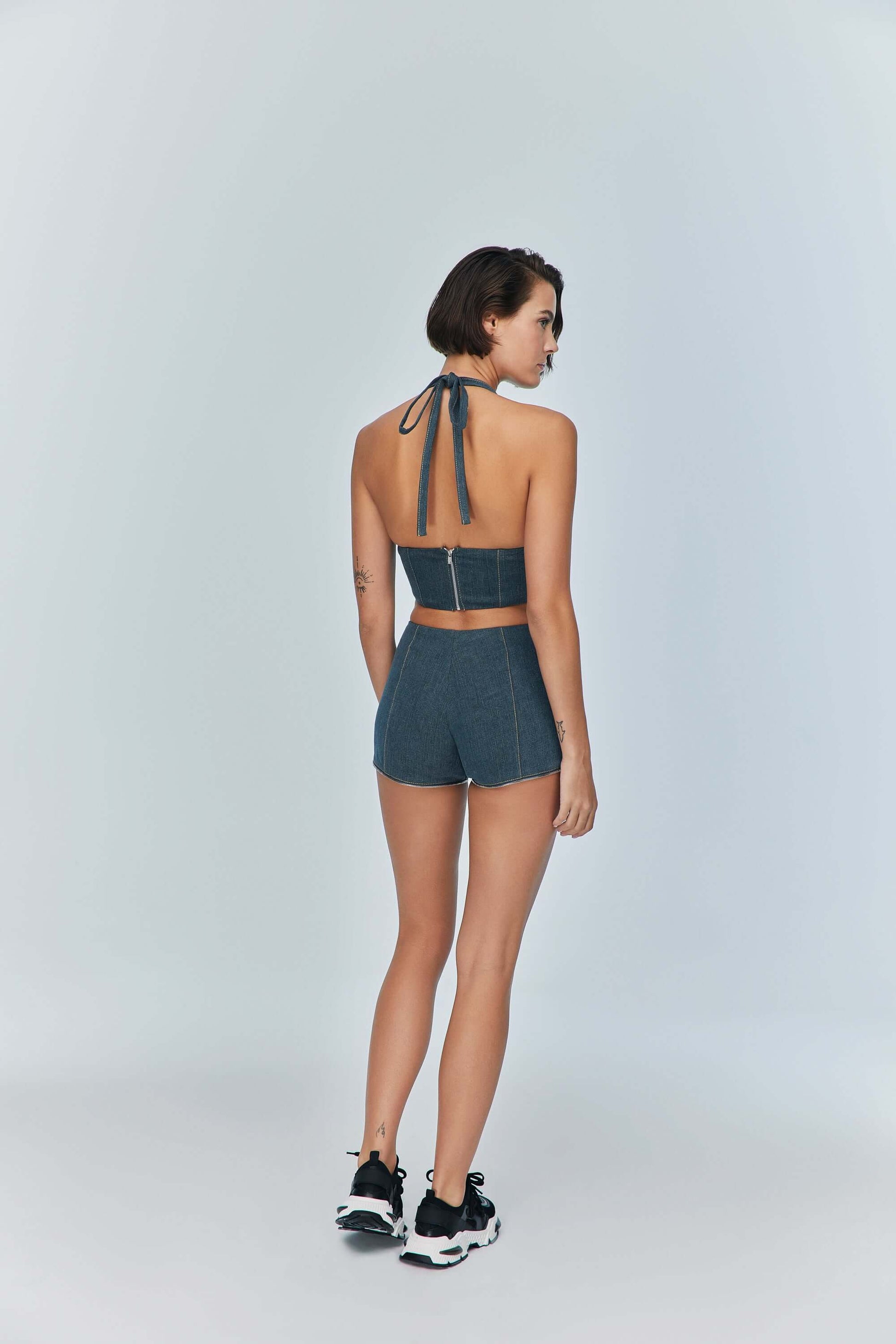 JENDUE Monte Denim Crop Top - Halter Neck & Lace-Up Detail